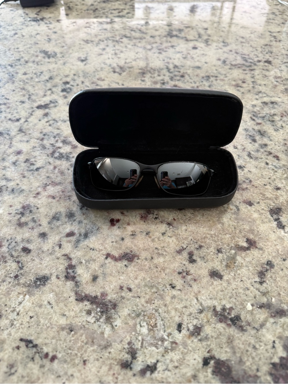 Black Revo Curved Frame Sunglasses with Hard Case